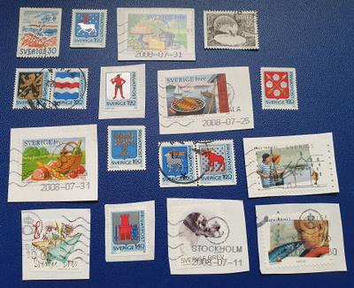 18 vähän uudempaa ruotsalaista postmerkkiä puolet leikkeillä