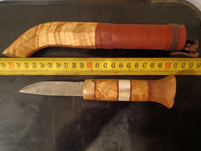 Upea moniosainen käsintehty puukkosepän puukko.
