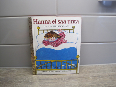 TAMMEN KULTAISET KIRJAT, HANNA EI SAA UNTA no 154, 1980