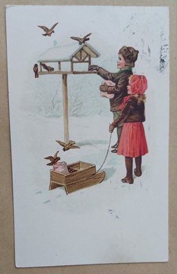 Lapset viemässä lintulaudalle jyviä ja syötävää, p .1915