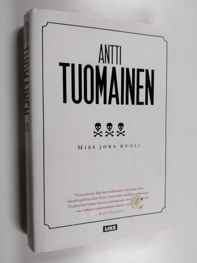 Antti Tuomainen : Mies joka kuoli (signeerattu, tekijän o...