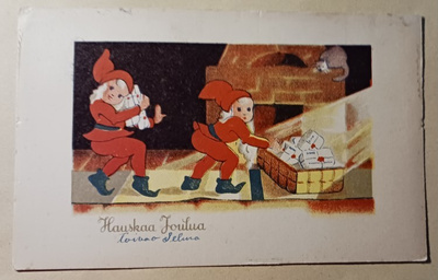 Tonttuleidit tuovat paketteja, kissa pankolla, p. 1937