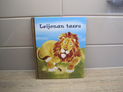 TAMMEN KULTAISET KIRJAT, LEIJONAN TASSU no 182