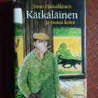 Kätkäläinen ja musta koira - pikkukuva 1