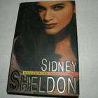 Sidney Sheldon Naamioiden aika -sid - pikkukuva 1