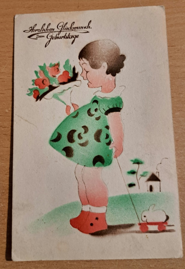 tytöllä kukkakimppu, saksankielinen, käsipostissa 1945