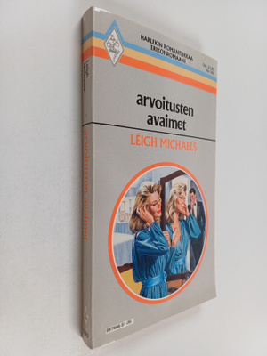 Leigh Michaels : Arvoitusten avaimet