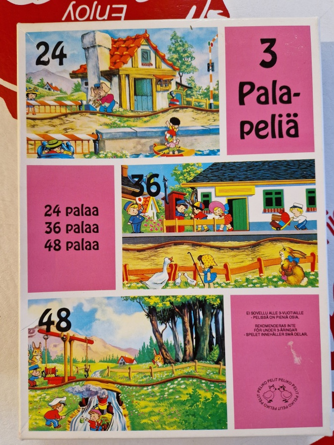 Kolme palapeliä lapsille samassa laatikossa.Peliko Pelit