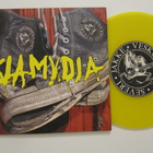 Klamydia Miljoonan Kilsan Tennarit Keltainen 7" sinkku - pikkukuva 1