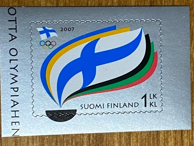 SUOMEN OLYMPIAKOMITEA 100 VUOTTA**
