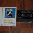 C-kasetti - MANU DIBANGO - Electric Africa - 1985 funk EX+ - pikkukuva 1