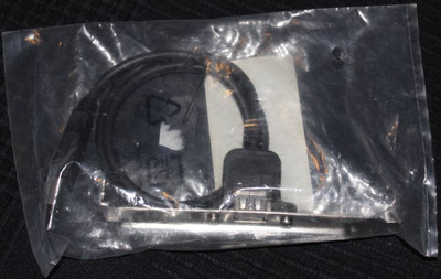 USB-portti takapaneeliin tai kotelon sisään - jatkokaapeli