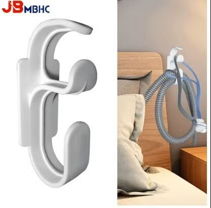 Uniapnea laite letkun ja/tai johtojen pidike.  Resmed yms.