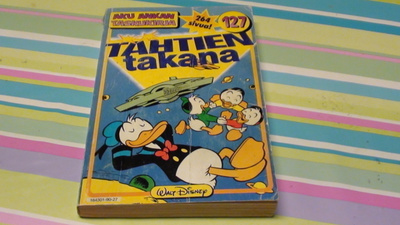 AKU ANKAN TASKUKIRJA 127 : TÄHTIEN TAKANA