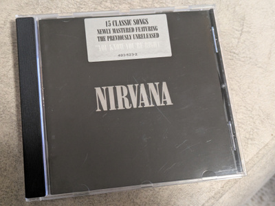 Nirvana (CD) MINT!! s/t 15 Classic Songs + Hypersticker
