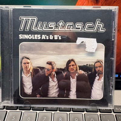 MUSTASCH - Singles A’s & B’s cd