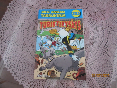 Aku Ankan taskukirja 325 Turistirysäys 1.p *