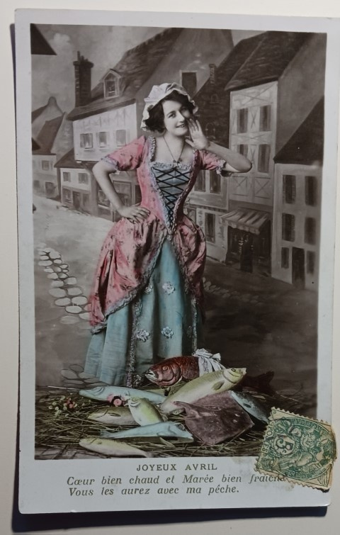 Viehättävä leidi ja kalakeko, trad. Aprillipäiväkortti, 1917