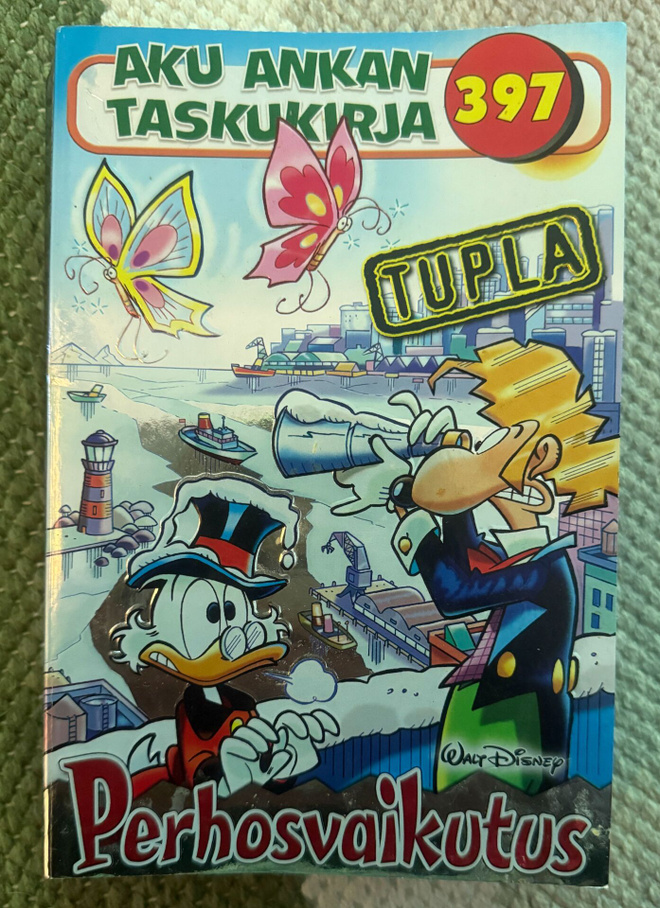AKU ANKAN TASKUKIRJA 397 - PERHOSVAIKUTUS (TUPLA)