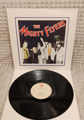 The Mighty Flyers Radioactive Material lp