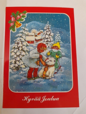 Lapset ja koira lumisatteessa