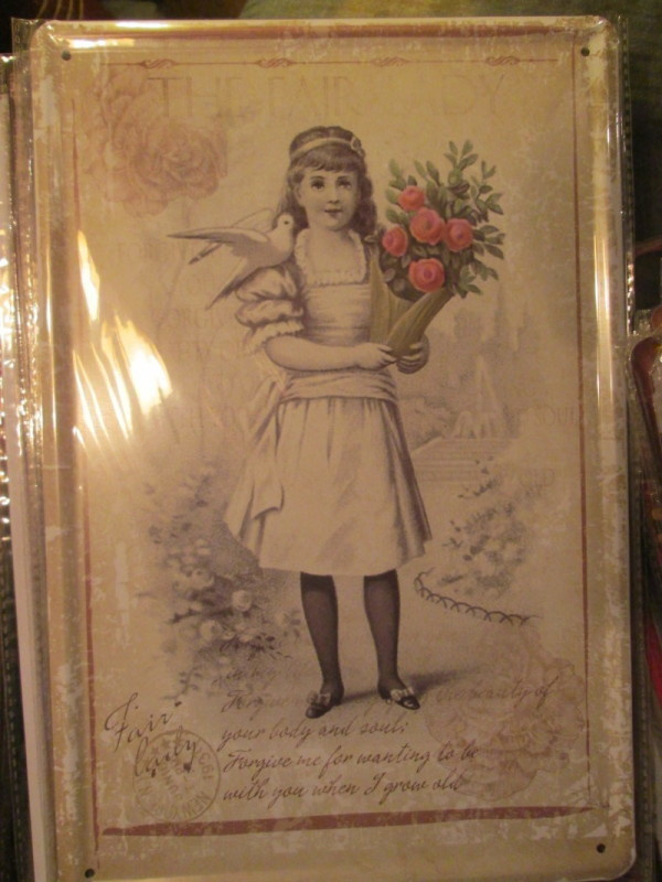 Peltikyltti The Fair Lady. Tyttö ja kyyhky