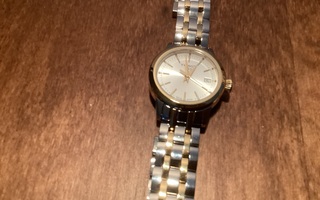 Tissot miesten/naisten rannekello, uusi