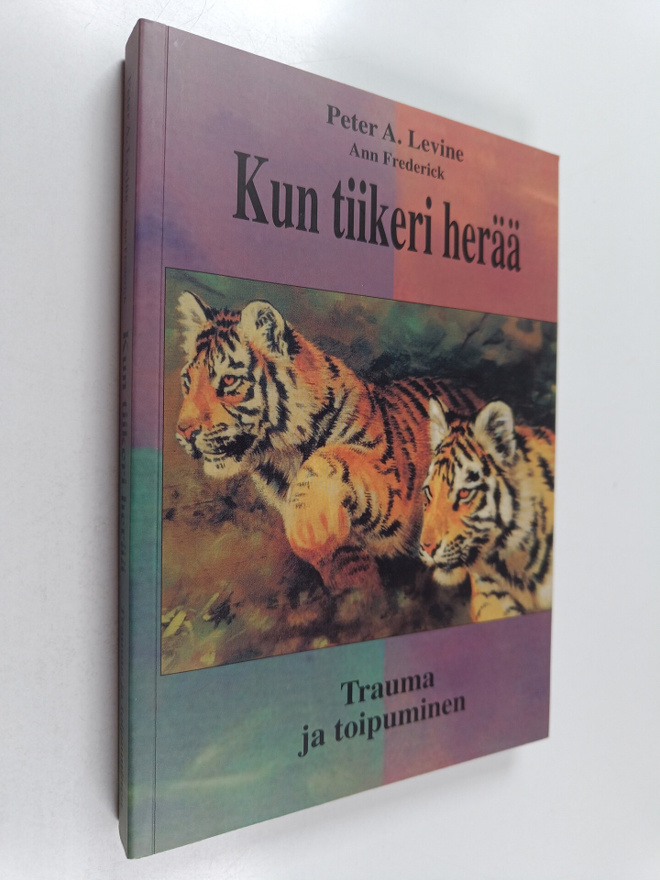 Peter A. Levine ym. : Kun tiikeri herää : trauma ja toipu...