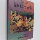 Peter A. Levine ym. : Kun tiikeri herää : trauma ja toipu... - pikkukuva 1