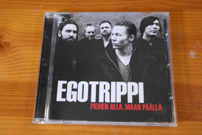 Egotrippi:Pilvien alla,maan päällä CD
