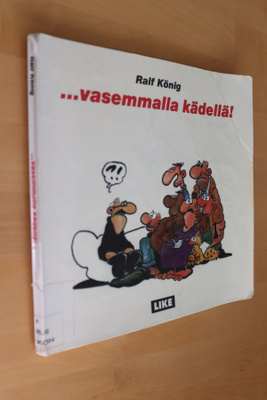 Ralf König : ... vasemmalla kädellä! ( 1.p. 1996 k.po )
