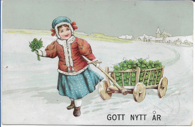 Lapsi vetää onnenapilakärryä, kulkenut 1913