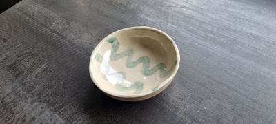 Pieni sisutuskulho,mitat 12 x 3 cm.