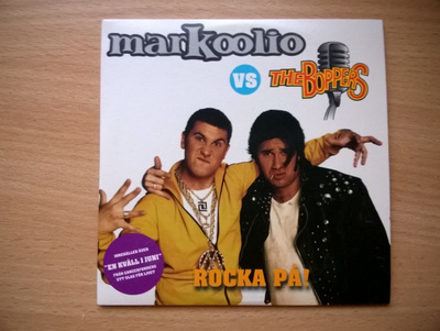 Markoolio - Rocka På CDS