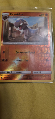 Cranidos 64/156 Sun & Moon Ultra Prism reverse holo card