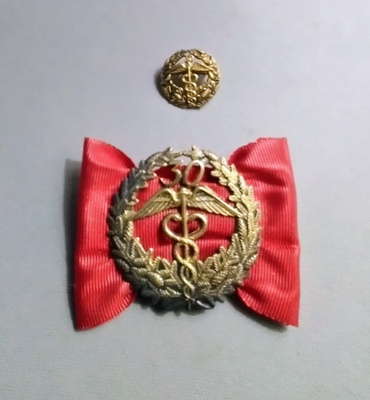 KAUPPAKAMARIN ANSIOMERKKI 30 VUOTTA