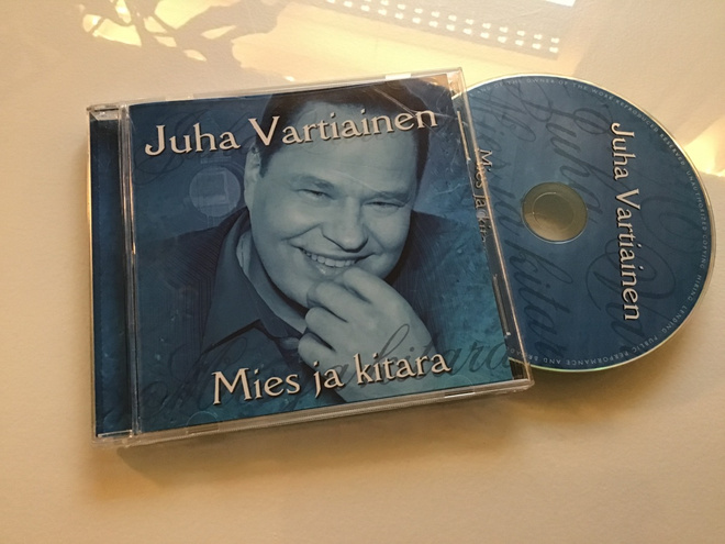 Juha Vartiainen . Mies ja kitara CD nimmarilla