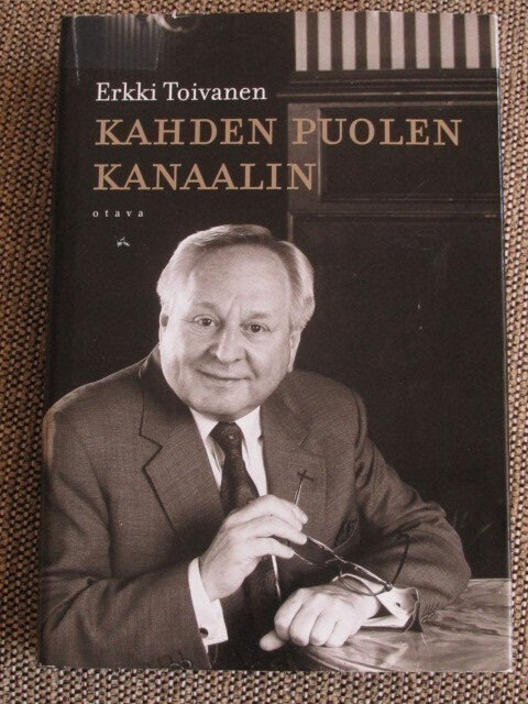 Erkki Toivanen KAHDEN PUOLEN KANAALIN