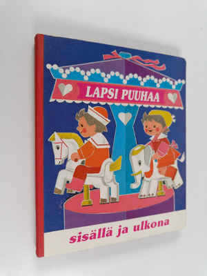 Lapsi puuhaa sisällä ja ulkona