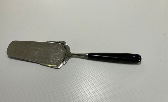 Vintage kakkulapio, teräs ja musta bakeliitti