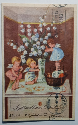 Pikkuenkelit asettelevat kielokimppua onnitteluiksi, p. 1944