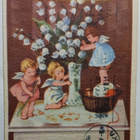 Pikkuenkelit asettelevat kielokimppua onnitteluiksi, p. 1944 - pikkukuva 1