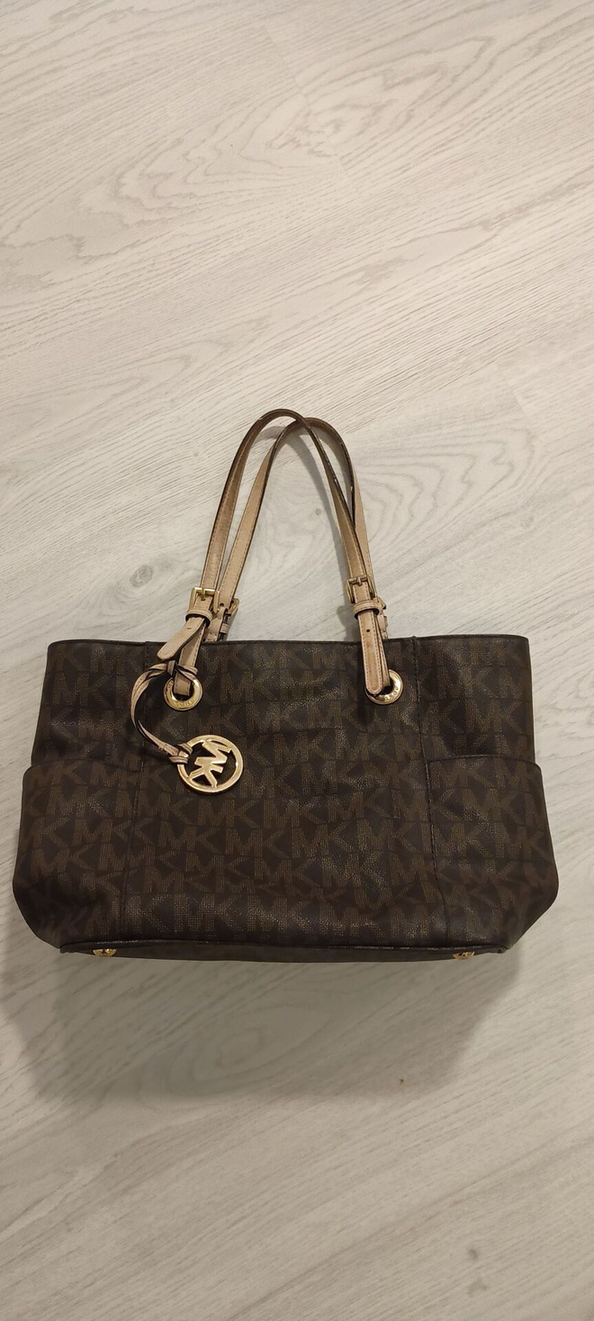 Michael Kors ruskea nahkalaukku