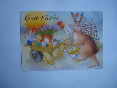 Jänis työntää kottikärryjä. God Påske