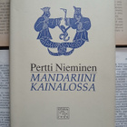 Pertti Nieminen - Mandariini kainalossa: kirjoituksia (sid.) - pikkukuva 1