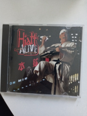 CD John Hiatt - Comes Alive At Budokan ( Sis.postikulut )