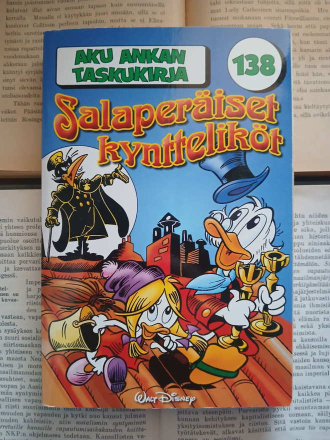 Aku Ankan taskukirja 138 • Salaperäiset kyntteliköt