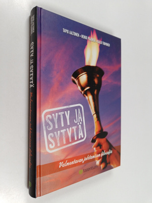 Heikki Pajunen ym. : Syty ja sytytä : valmentavan johtami...
