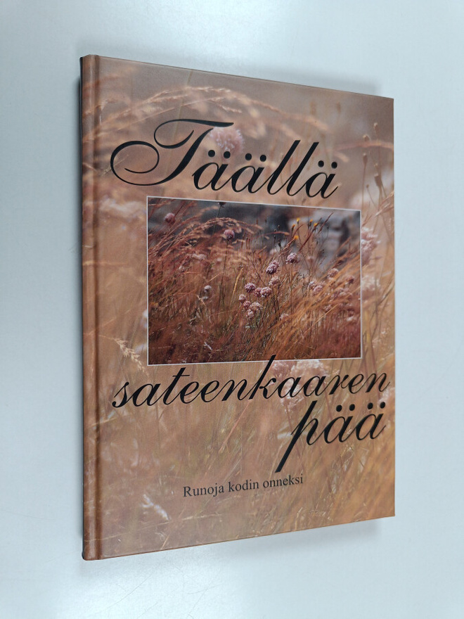 Täällä sateenkaaren pää : runoja kodin onneksi