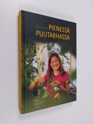 Eija Klaucke : Pienessä puutarhassa : unelmien täyttymyksiä
